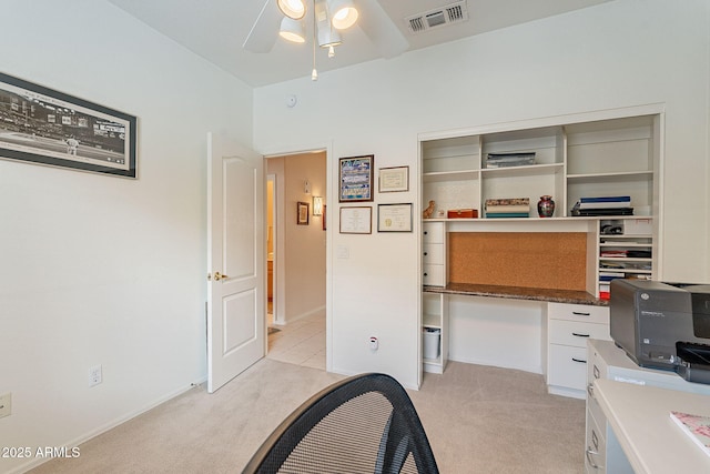 office area with light colored carpet and ceiling fan