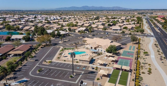 birds eye view of property featuring a mountain view