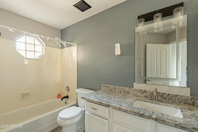 full bathroom featuring visible vents, tub / shower combination, toilet, and vanity