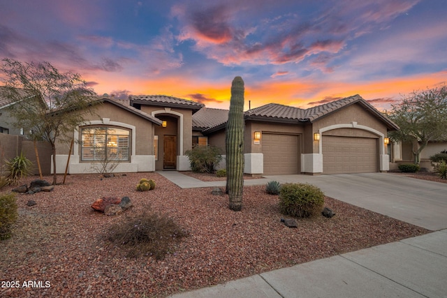 view of front of home with a garage