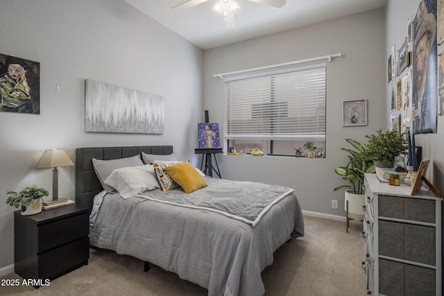 bedroom with ceiling fan and light colored carpet
