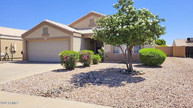 view of front of house with a garage