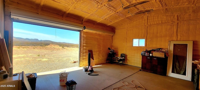 view of horse barn with a mountain view