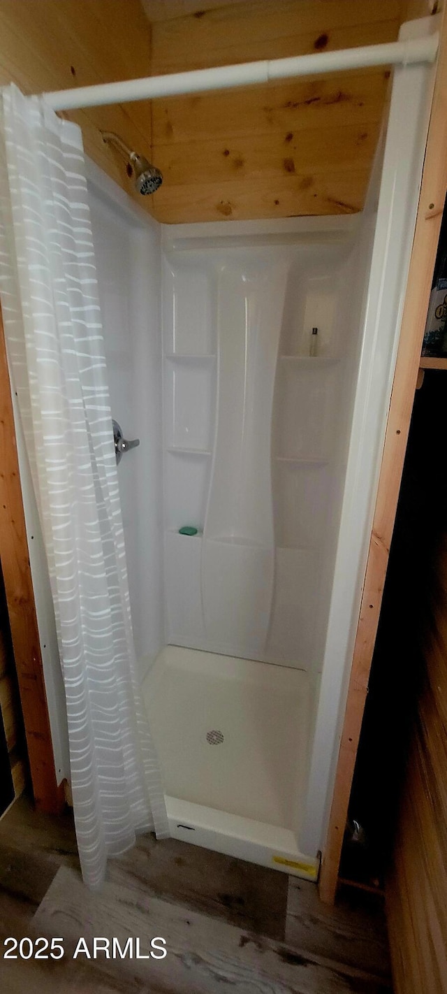 full bathroom with a shower stall