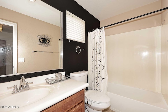 full bathroom with vanity, toilet, and shower / tub combo with curtain