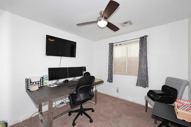 home office with ceiling fan and carpet floors