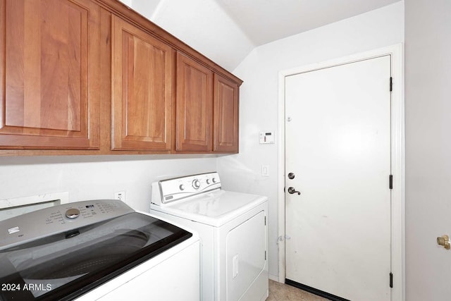 laundry room featuring cabinets and independent washer and dryer