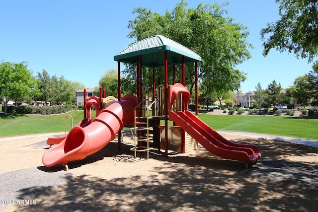 view of play area featuring a lawn