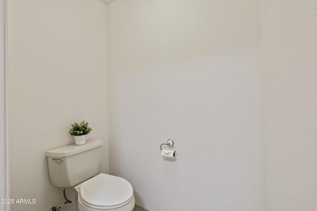 bathroom featuring toilet