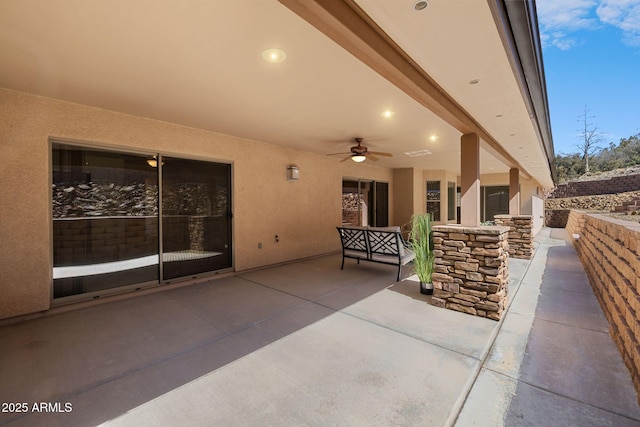 view of patio / terrace featuring a ceiling fan