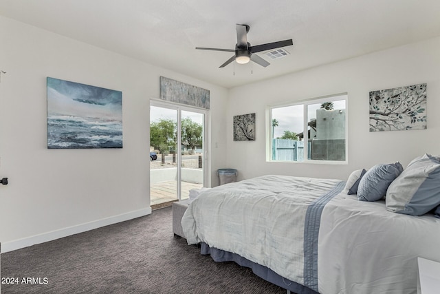 carpeted bedroom with ceiling fan and access to outside