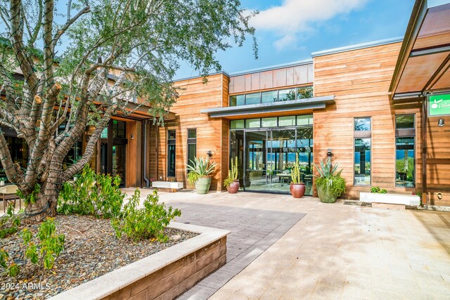 exterior space with outdoor lounge area and a patio