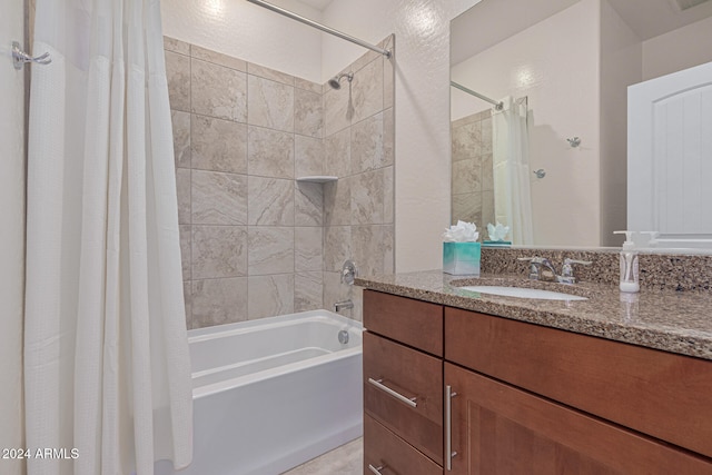 bathroom with shower / tub combo with curtain and vanity