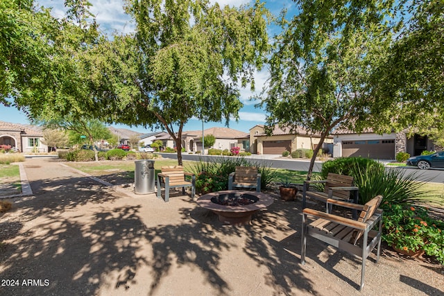 view of patio / terrace featuring a fire pit