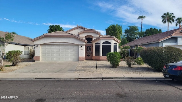 view of front of home with a garage