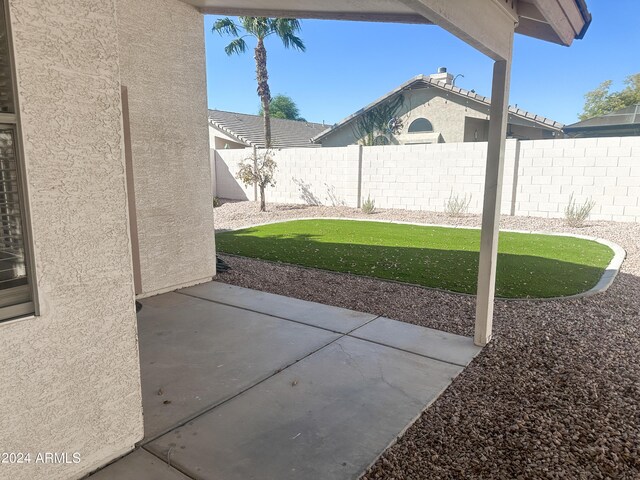 rear view of house with a patio area and central air condition unit