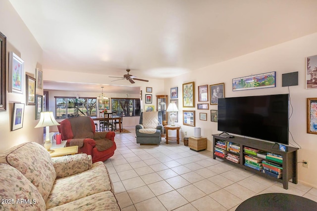 tiled living room featuring ceiling fan