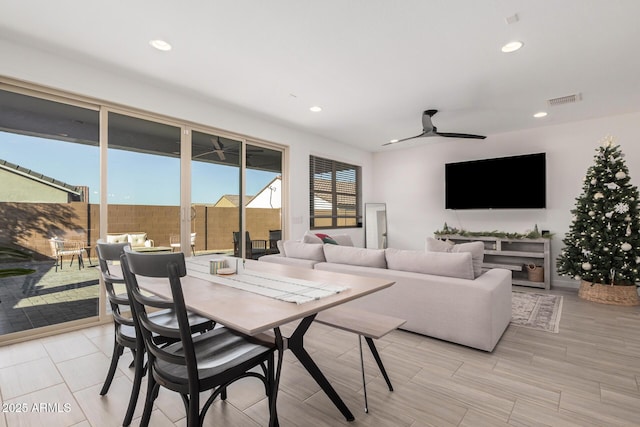 dining space featuring ceiling fan