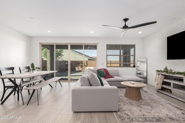 living room featuring ceiling fan