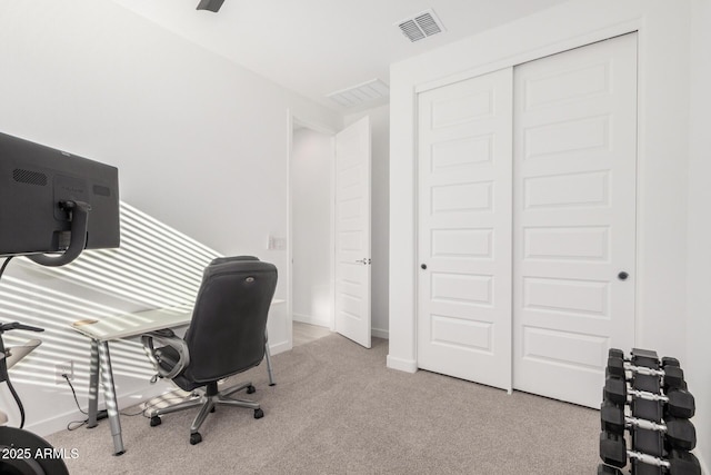 office area with light colored carpet