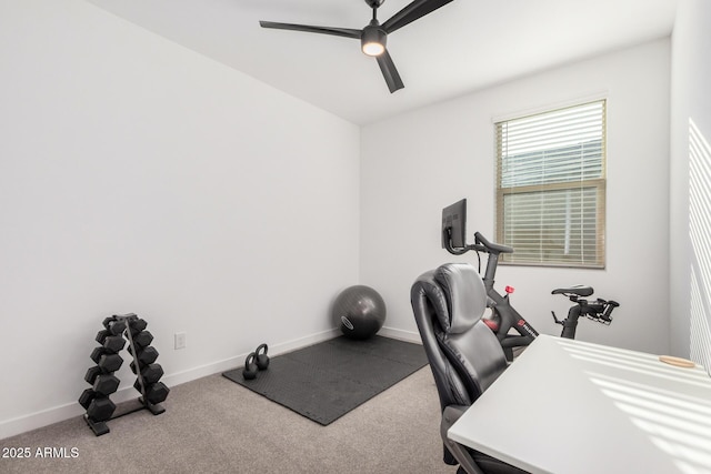 carpeted home office with ceiling fan