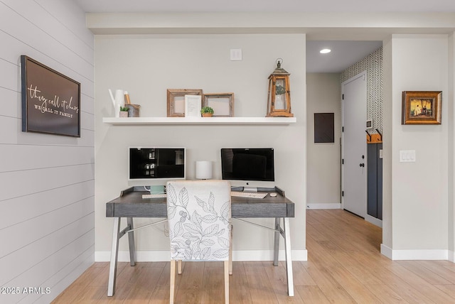 office space with recessed lighting, wood finished floors, and baseboards