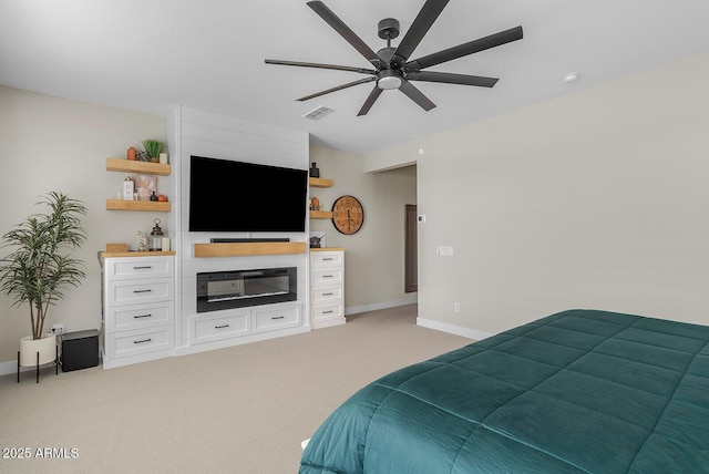 bedroom with visible vents, light colored carpet, a ceiling fan, and baseboards