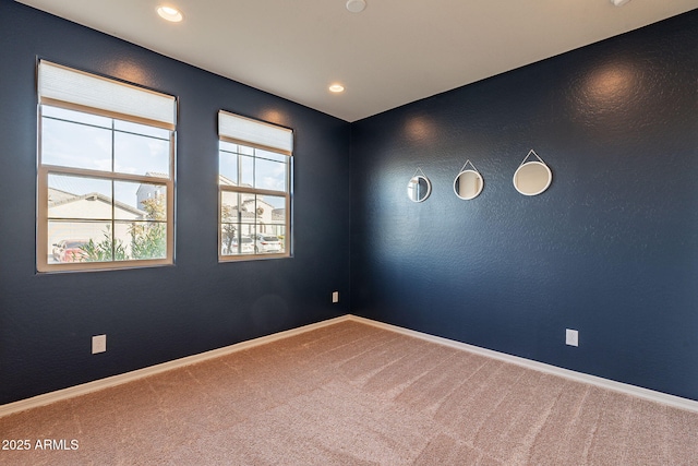 empty room with carpet flooring