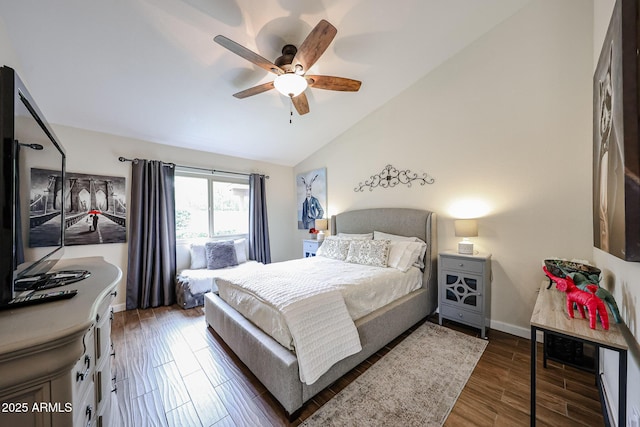 9085 E Windrose Dr, Scottsdale, AZ 85260 - bedroom featuring vaulted ceiling, wood finished floors, and a ceiling fan