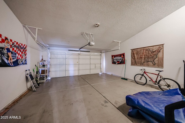 9085 E Windrose Dr, Scottsdale, AZ 85260 - garage featuring a garage door opener and water heater
