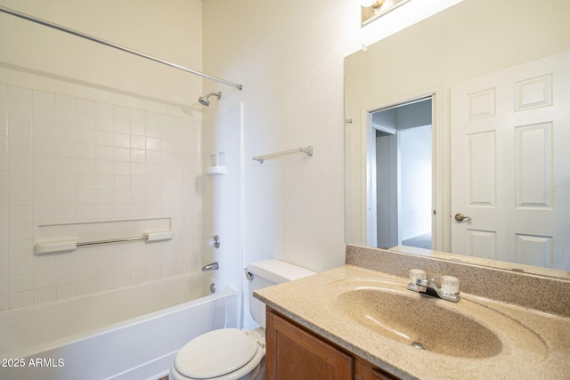 full bathroom with bathtub / shower combination, vanity, and toilet