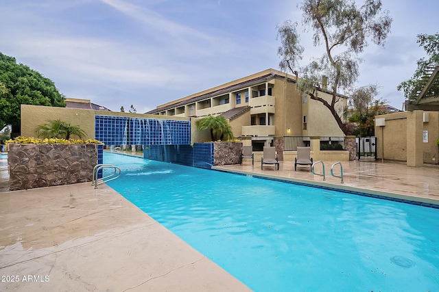 pool featuring fence