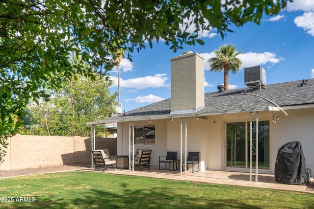 2418 E Hermosa Dr, Tempe, AZ 85282 - rear view of property with a patio area, central AC, a shingled roof, and a chimney