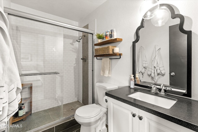 2418 E Hermosa Dr, Tempe, AZ 85282 - full bathroom featuring toilet, a stall shower, and vanity