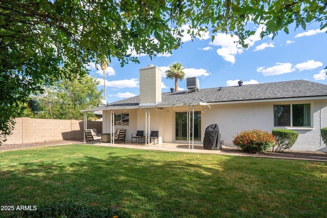 2418 E Hermosa Dr, Tempe, AZ 85282 - back of house featuring central air condition unit, a chimney, a patio, and roof with shingles