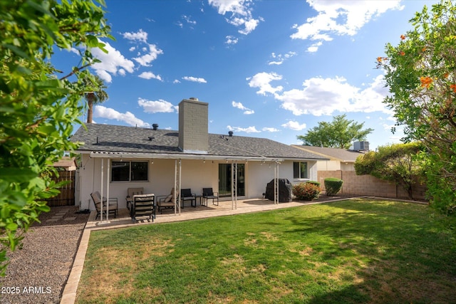 2418 E Hermosa Dr, Tempe, AZ 85282 - back of house featuring a chimney and a patio