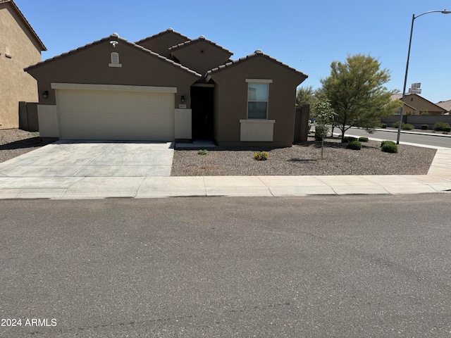 view of front of property with a garage