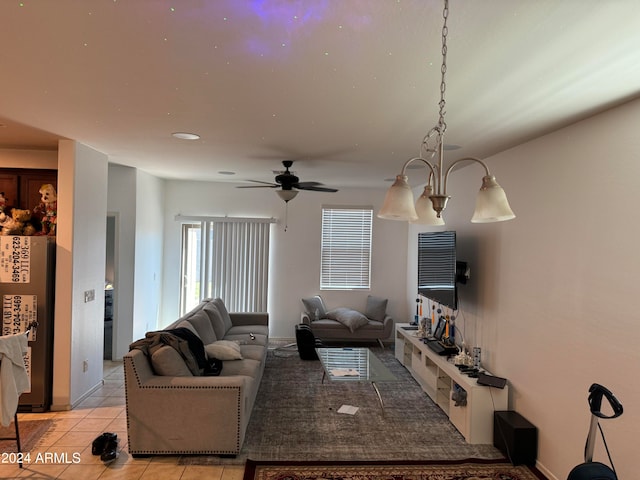 tiled living room with ceiling fan