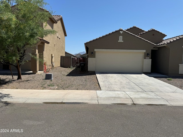 view of front of property featuring a garage