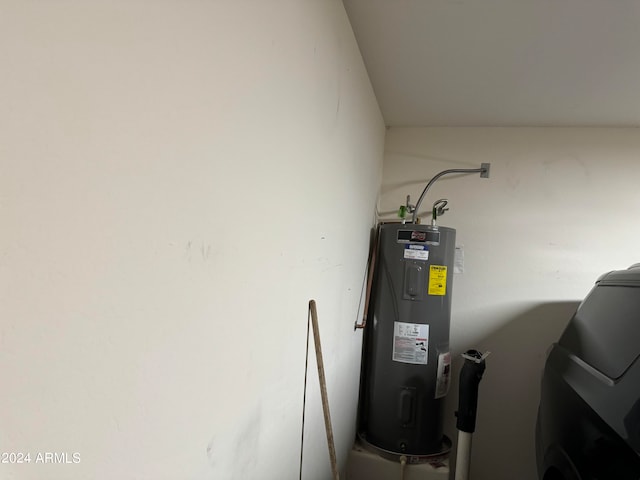 utility room with water heater