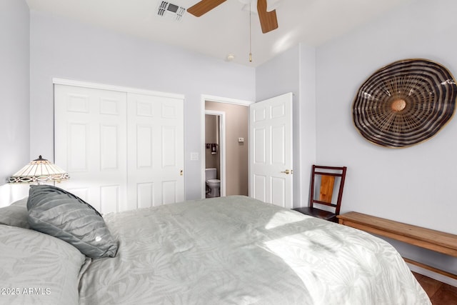 bedroom with ceiling fan and a closet