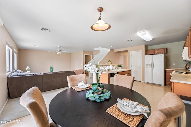 2327 E Meadow Creek Way, San Tan Valley, AZ 85140 - dining room with a ceiling fan