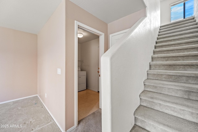 2327 E Meadow Creek Way, San Tan Valley, AZ 85140 - staircase featuring washer / dryer, baseboards, and carpet floors