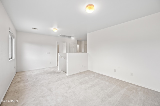 2327 E Meadow Creek Way, San Tan Valley, AZ 85140 - empty room featuring light carpet and baseboards