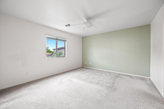 2327 E Meadow Creek Way, San Tan Valley, AZ 85140 - carpeted spare room featuring a ceiling fan and baseboards