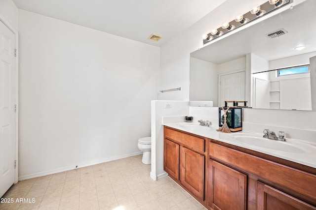 2327 E Meadow Creek Way, San Tan Valley, AZ 85140 - bathroom with double vanity, toilet, baseboards, and a shower