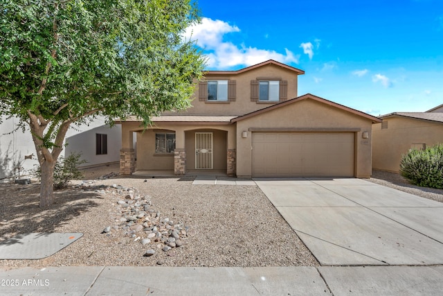 2327 E Meadow Creek Way, San Tan Valley, AZ 85140 - view of front facade featuring stucco siding, concrete driveway, stone siding, and an attached garage