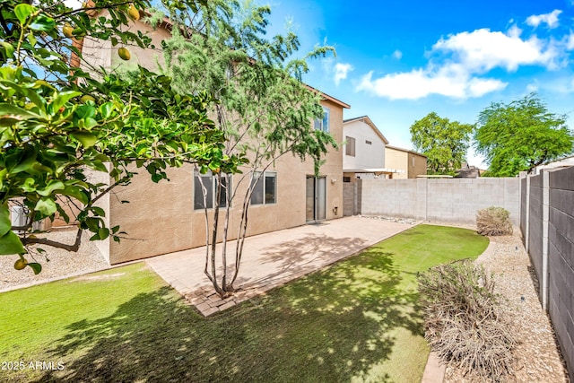 2327 E Meadow Creek Way, San Tan Valley, AZ 85140 - fenced backyard featuring a patio area