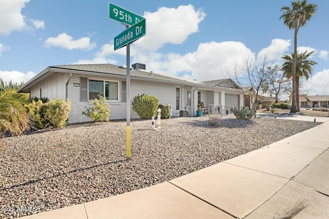 single story home featuring a garage