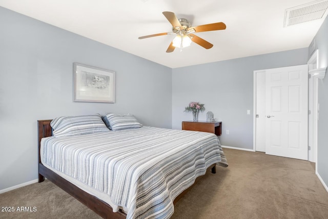 carpeted bedroom with ceiling fan